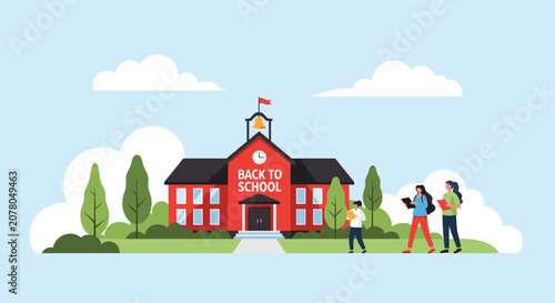 Students walk towards a red school building with a clock and a bell tower on a sunny day with green trees and white clouds.