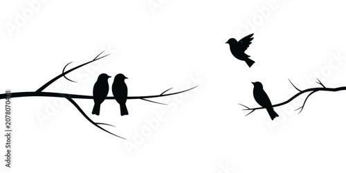Tableau sur toile Three black bird silhouettes on bare tree branches against a white background Ke