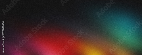Abstract image with a dark, grainy texture showcasing a vibrant rainbow gradient light effect across bottom, creating a striking backdrop.