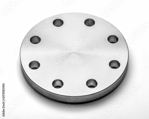 Stainless steel 304 blind flange with phonographic serrated face and bolt holes. Used to seal or terminate industrial and process pipework ends.