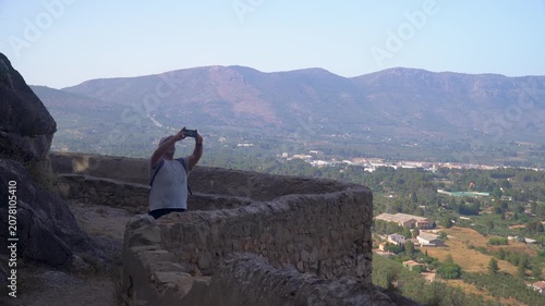 Man enjoying the views from a viewpointer.