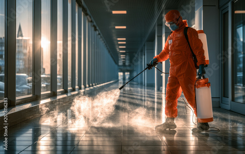 Professional Sanitization Operation in Modern Facility at Sunset