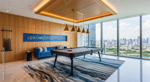 Luxury penthouse living room with pool table and city view.
