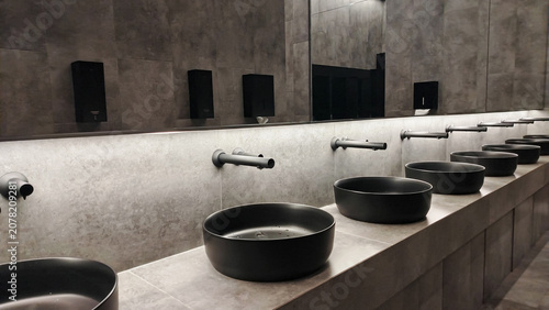 Fotografie Contemporary washroom interior with row of sinks