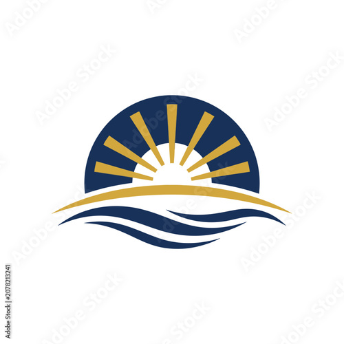 Blue and gold rising sun over ocean waves.