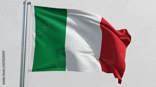 Waving flag of italy on a flagpole against a clear sky background