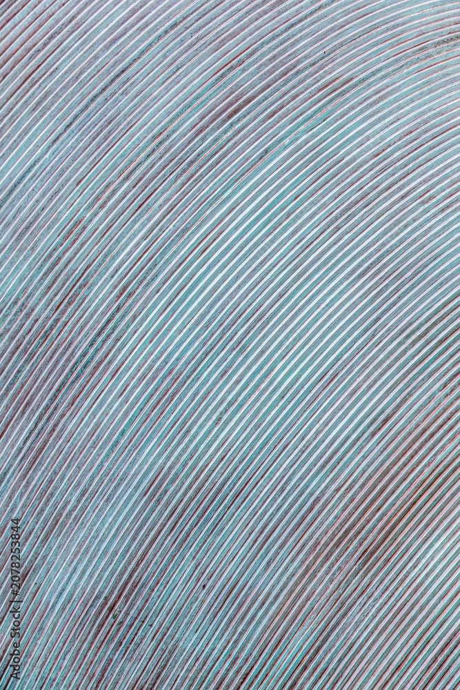 Fototapeta premium Abstract Turquoise Striped Texture With Curved Diagonal Lines And Subtle Distressed Patina Background