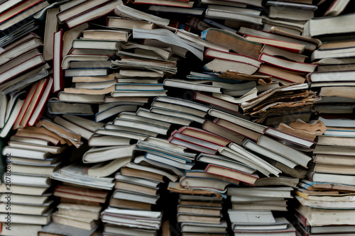 Stack of Old Books Background with Vintage Paper Texture
