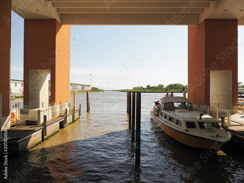 Canvas-taulu Public transport boat moored at wooden pilings in Venice airport Darsena dock wi