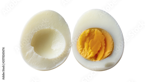 Fényképezés Isolated hard-boiled egg halves showing creamy white albumen and firm cooked yel