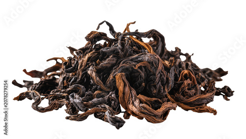 Tableau sur toile Isolated pile of dry, dark, twisted oolong tea leaves ready for a warm aromatic