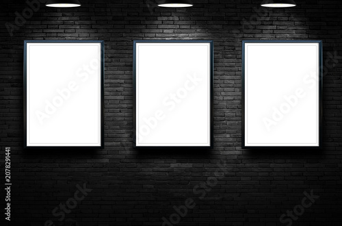 Black picture frame mockup on black dark room wall background