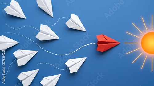 Red Paper Airplane Flying Towards a Bright Sun Goal Symbolizing Leadership Uniqueness and Ambition on Blue Background
