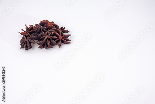 Fotografie Bunga Talang or Star anise pods rest on a clean white surface