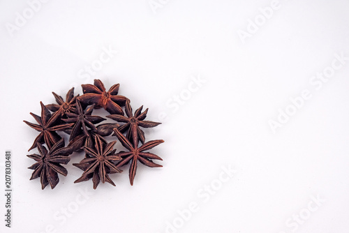 Fotografie Bunga Talang or Star anise pods rest on a clean white surface