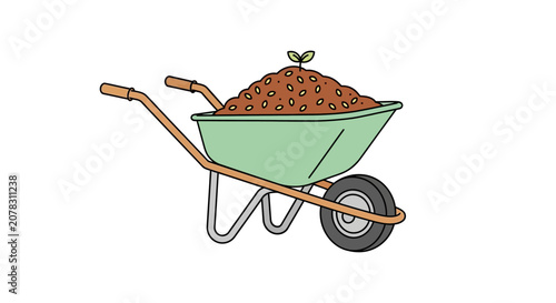 Green wheelbarrow filled with soil.