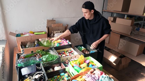Sorting and recycling household waste. Volunteer at the eco-center