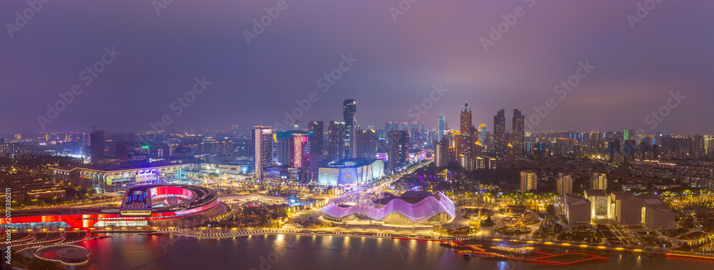 Fototapeta premium Aerial view of Suzhou night, cityscape panorama of Suzhou Museum, Theatre and Science and Technology Museum landmarks, China