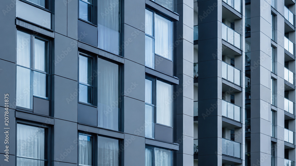 Obraz premium Modern apartment building facade with balconies