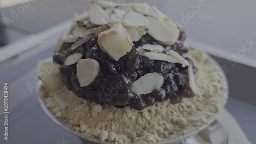 Patbingsu, a summer snack with almonds on it