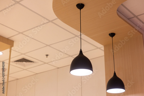 Warm modern lighting in stylish interior with geometric decor