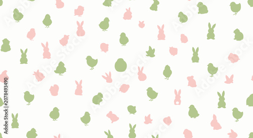 Easter themed pattern with rabbits chicks leaves and eggs on white background