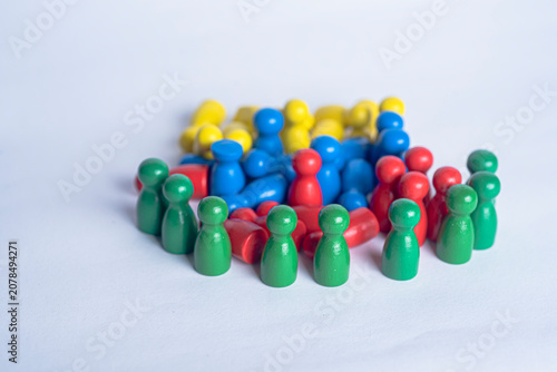 Colorful peg figures representing unity and resilience after natural disaster