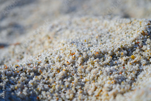 Macro texture of quartz sand grains on Is Arutas beach in Cabras, Sardinia, Italy