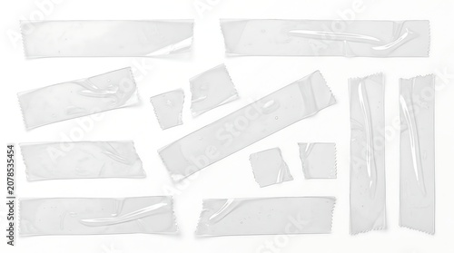 Collection of various clear adhesive tape pieces with wrinkles and torn edges, isolated on a clean white background.