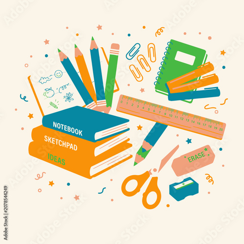 Colorful school supplies and notebooks stacked.