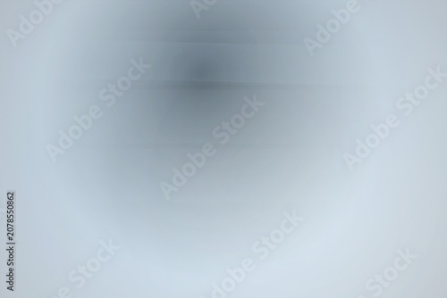 Fotografie Blurred abstract shape on light blue background