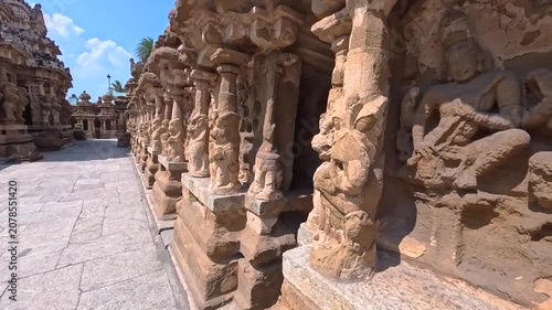 Movement along the sculptures in the ancient temple of Lord Shiva in Sri Rangam