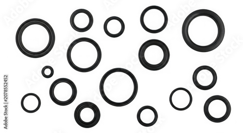 Black circles on white background, scattered shapes