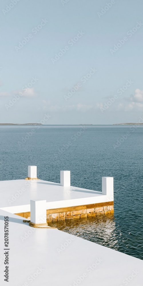 Fototapeta premium Surreal a calm harbor water surface lifting like a folded sheet against a realistic white dock for climate change and storm surge concepts