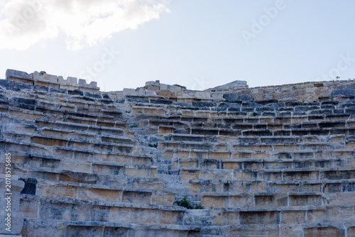 Ancient stone theater seating in a historic archaeological site