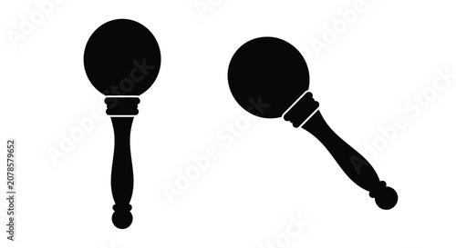 Valokuva Two black maraca silhouettes with detailed handles and rounded bodies on a white