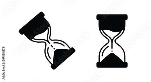 Cuadro en lienzo Two black hourglass silhouettes depicting the passage of time on a white backgro