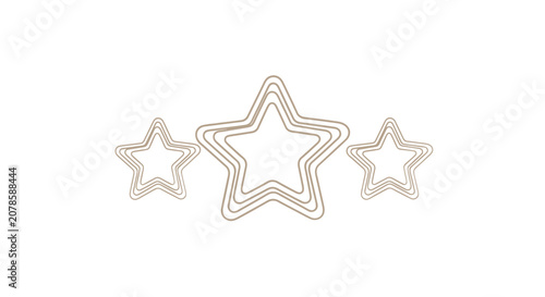 Bild auf Leinwand Three silver star shaped cookie cutters.