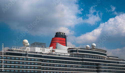Magnificent tourist cruise ship funnel and passenger cabins.