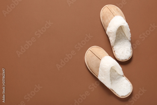 Soft beige slippers on brow...