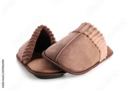 Soft brown slippers on whit...