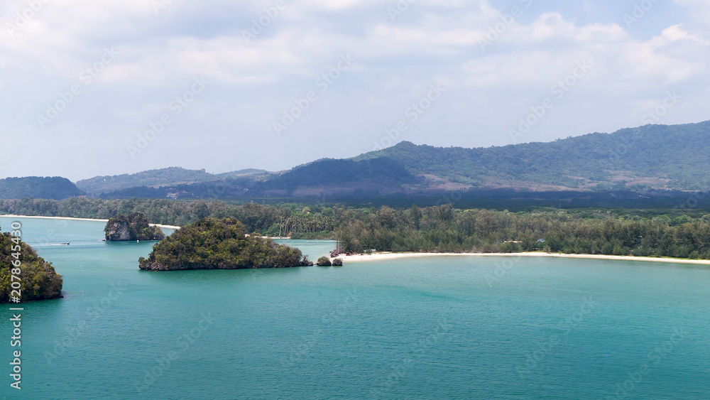 Fototapeta premium Aerial View of Tropical Limestone Karst Islands and Turquoise Sea in Krabi
