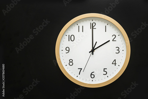 wall clock showing 2 o'clock . 14:00