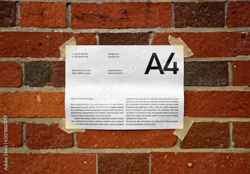 Mockup Of Customizable A4 Paper Taped To Wall