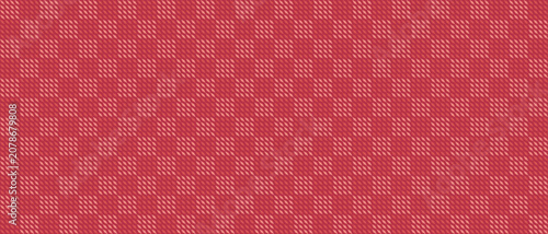 Fotografie Seamless textured red pattern featuring continuous diagonal stripes forming a woven fabric design