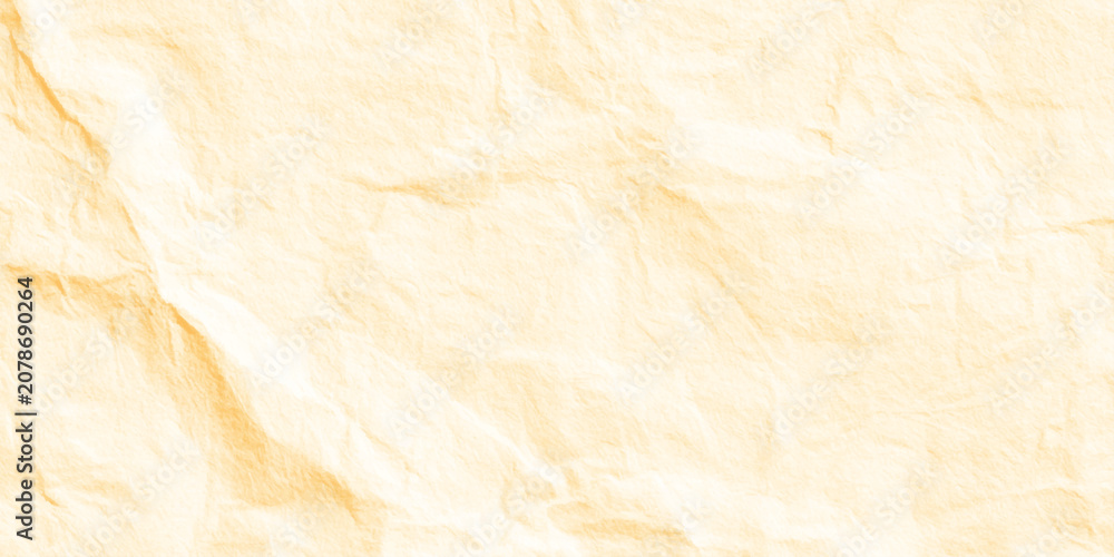 Fototapeta premium Crinkled beige paper texture background with soft folds and creases for design and craft projects