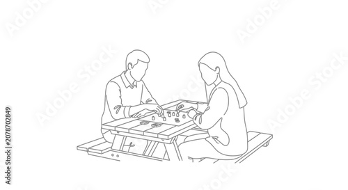 Two people playing chess on a wooden table outdoors.