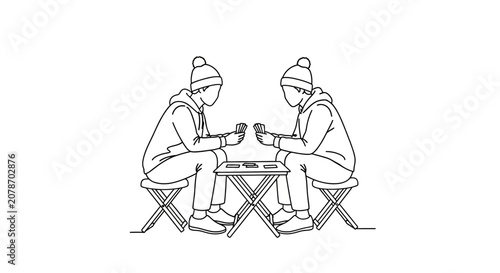 Two people sitting at a table with food and drinks.