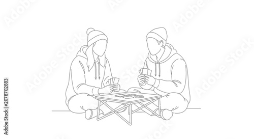 Two people enjoying a picnic meal outdoors together.