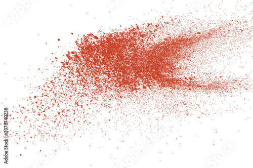 Photos Red paprika powder pile with scattered spice particles, isolated on a clean white background with a clipping path